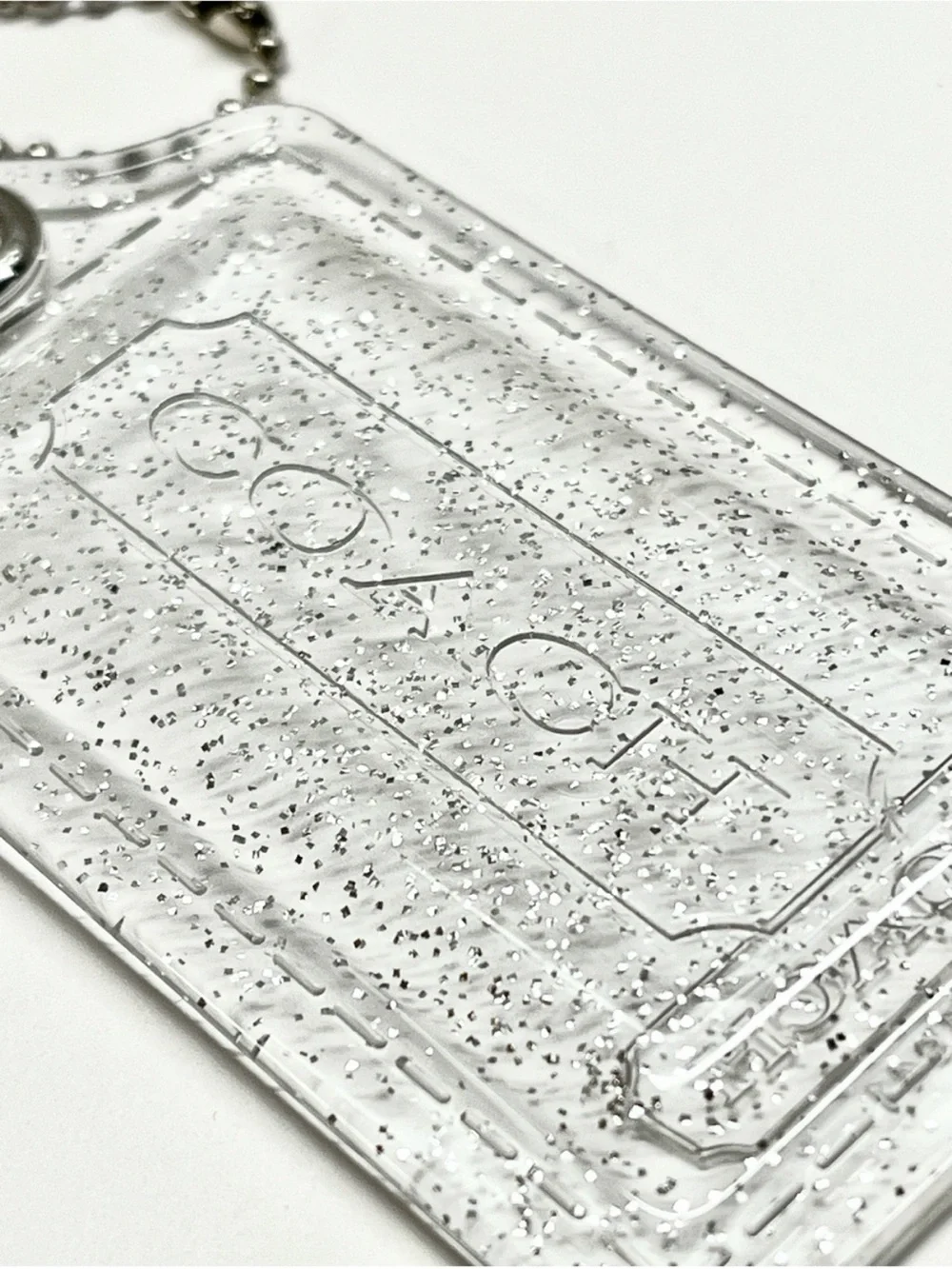 Coach Poppy Clear Glitter Hang Tag 3 1/2 inches long EUC